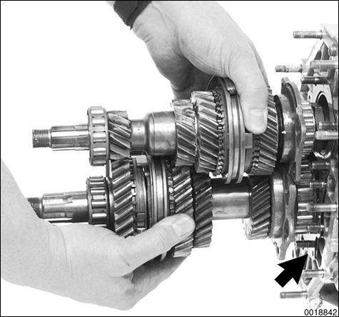 Step by step instruction with detailed photographs of transmission disassembly and assembly.
340 Manual Transmission-Controls and Case
page 340-15